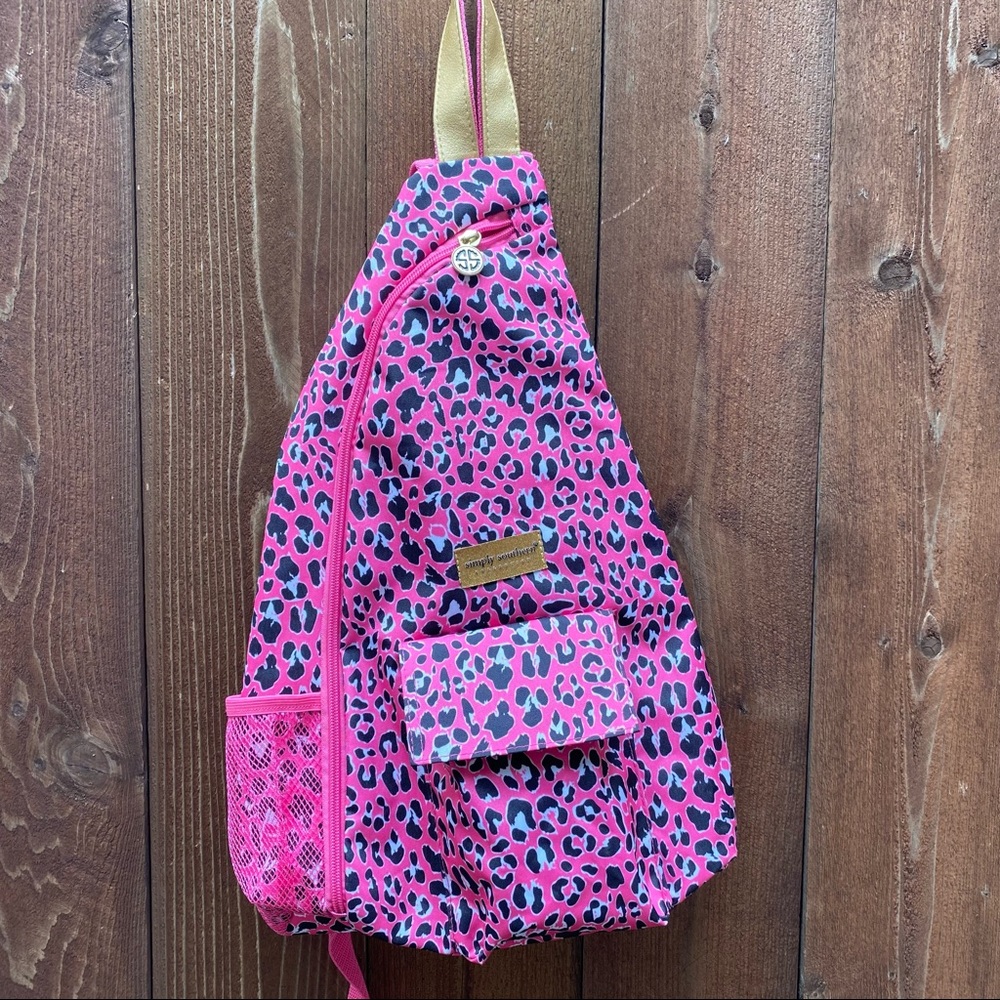 Simply Southern hot pink cheetah sling backpack with gold accents